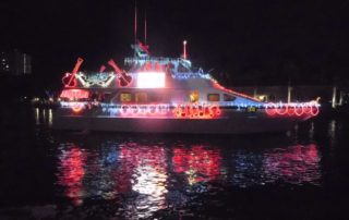 A boat decorated with holiday lights for the Pompano Beach boat parade