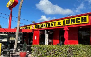 The exterior of Dandee Donut Factory, one of the best places to get breakfast in Pompano Beach
