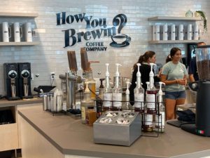 A picture behind the counter at How You Brewin Coffee Company, one of the new restaurants in Pompano Beach