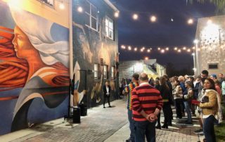 A mural being unveiled in Old Town Pompano Beach