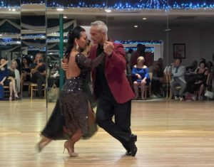 A couple dancing the tango on a romantic getaway to Pompano Beach